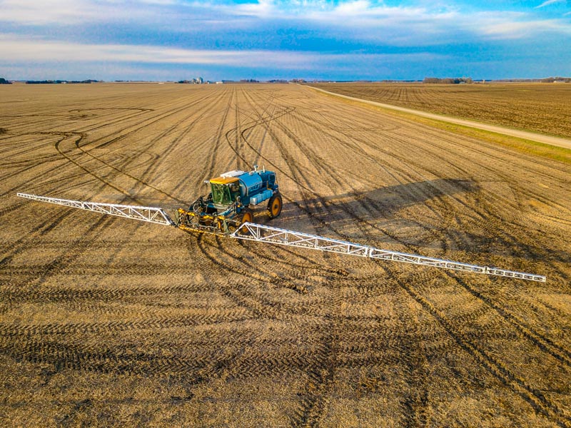 Hagie STS16 with 120' spray booms